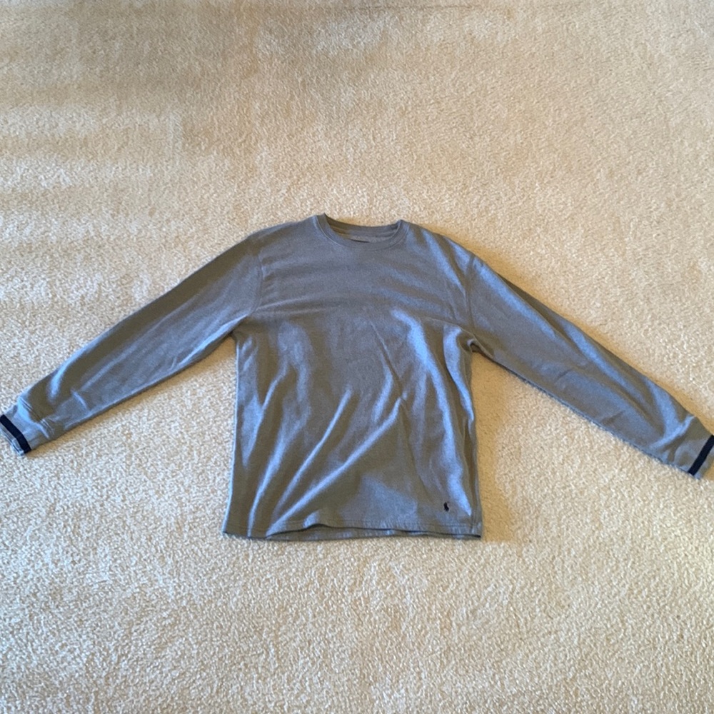 Grey polo crewneck.